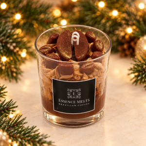 Brazilian Coffee candle with whipped wax and brown coffee-bean-shaped wax decorations, framed by Christmas greenery and golden lights.