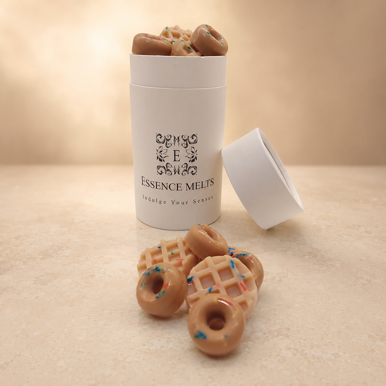 Gourmet Pastry scented wax melts in doughnut and waffle shapes with Essence Melts packaging