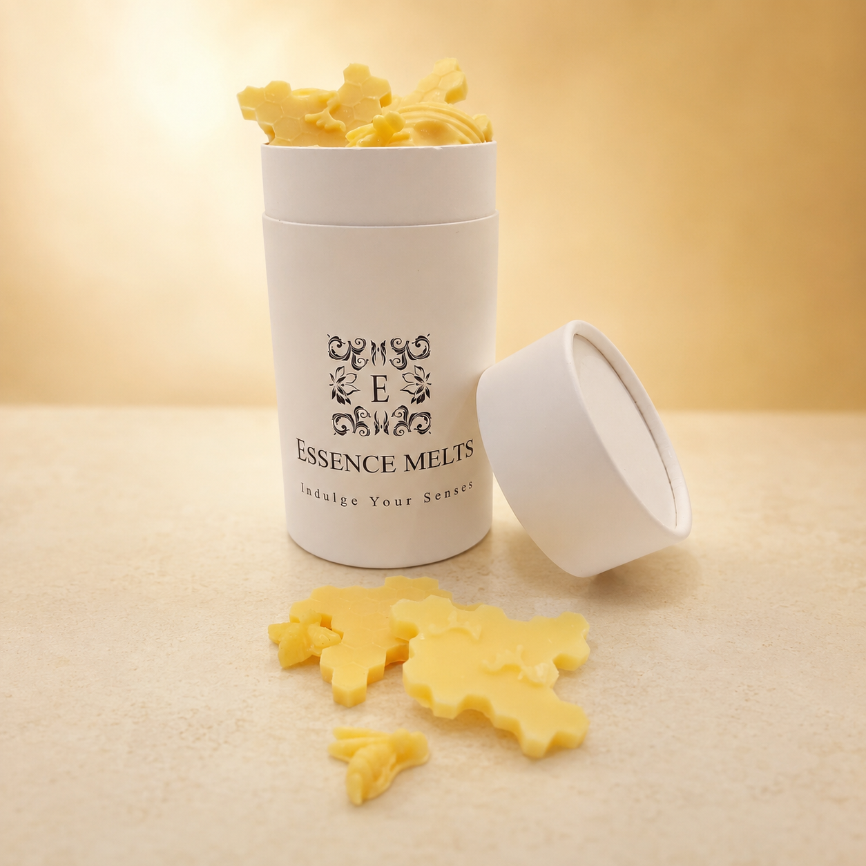 Honeycomb scented wax melts with bee and honeycomb designs in Essence Melts packaging