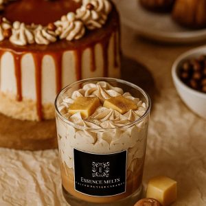 Salted butter caramel scented candle by Essence Melts, styled with caramel drizzle cake and chocolates in a cozy dessert-inspired setting.