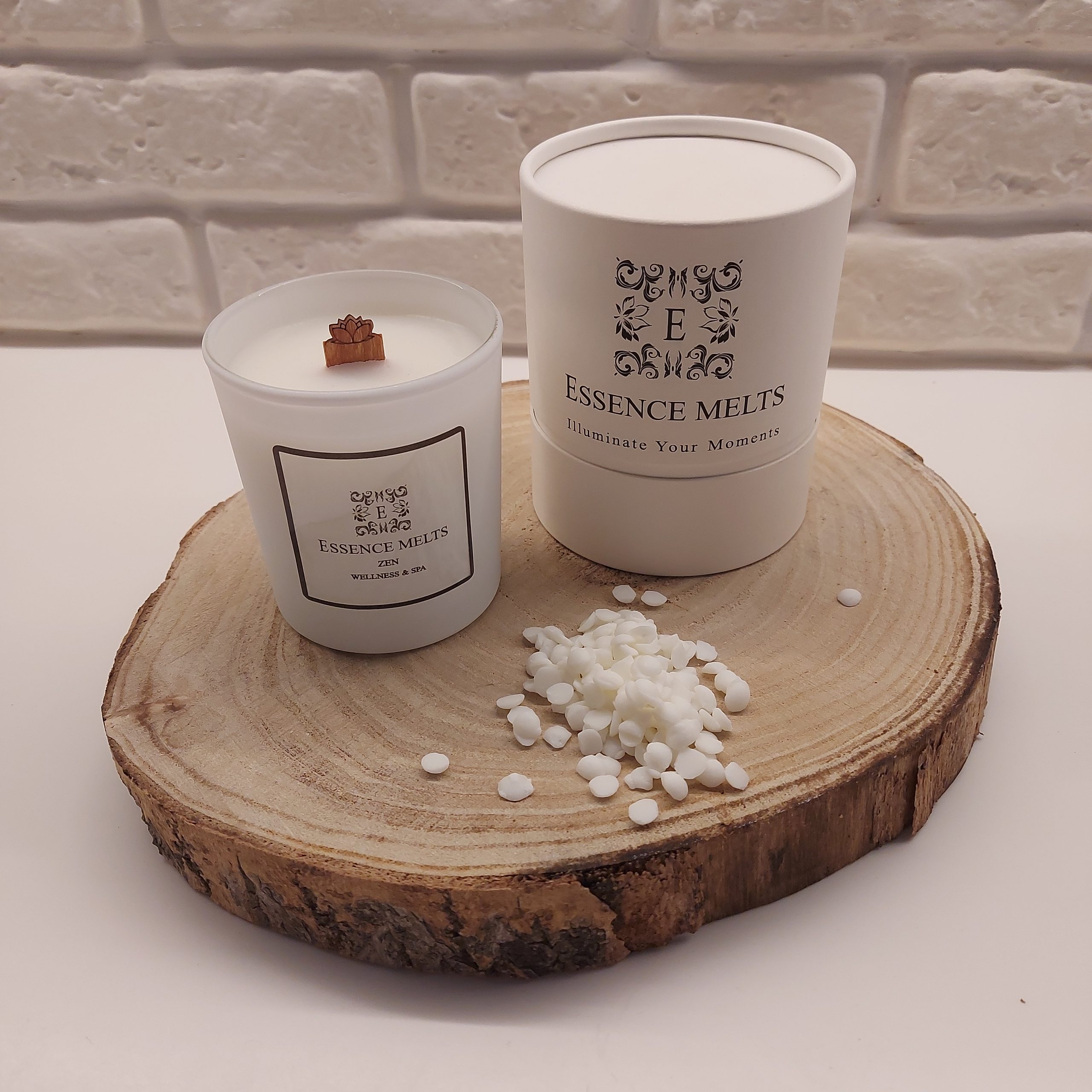 Zen candle in a white glass container with a cherry wood wick, styled to evoke calm and tranquility. Spa Candles