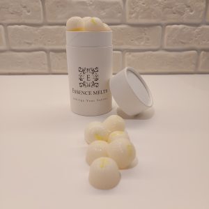 Lemon Meringue scented wax melts in a white biodegradable tube with the Essence Melts logo in black.