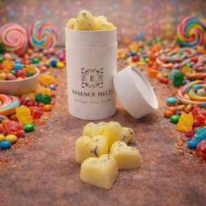 Spicy Candy scented wax melts in Essence Melts container styled with colorful sweets, gummy candies and lollipops in a cozy candy-themed background.