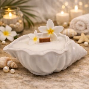Orange Blossom candle in a white glass jar with wax floral decoration, photographed in natural light. spa candles