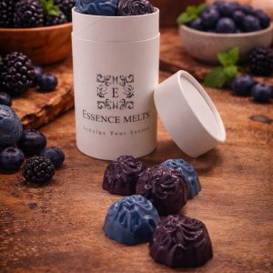 Blackberry and blueberry scented soy wax melts in purple and blue, displayed with Essence Melts branded packaging.