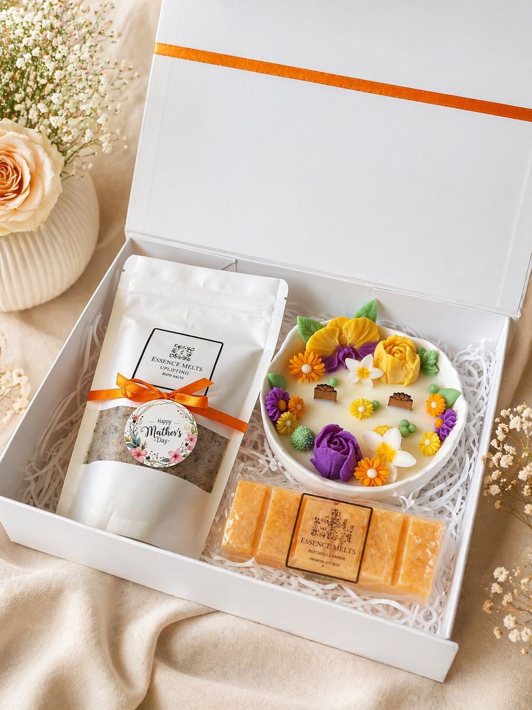 Mothers Day gift box with handmade floral candle, uplifting bath salts and patchouli amber wax melts by Essence Melts